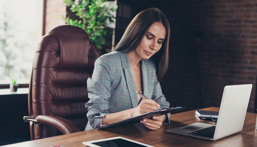 accountant in office working on accounts receivable